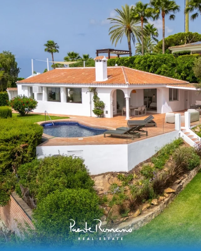 Beautiful single level villa in a peaceful cul-de-sac in Elviria.Asking price: €2,195,000❈ 1,254 m² double plot with landscaped gardens❈ 166 m² total built area, all on one level❈ Four bedrooms and three bathrooms❈ Southeast orientation with sea views❈ Heated private pool and covered porch❈ Rooftop chill-out solarium, sunrise to sunset❈ Private garage and 25 m² enclosed terrace roomEnergy Rating: Consumption: D / Emissions: DLocation: Elviria, Marbella EastReference: 16597More information: prre.link/16597Contact us to arrange a viewing.#PuenteRomanoRealEstate #ElviriaMarbella #MarbellaRealEstate