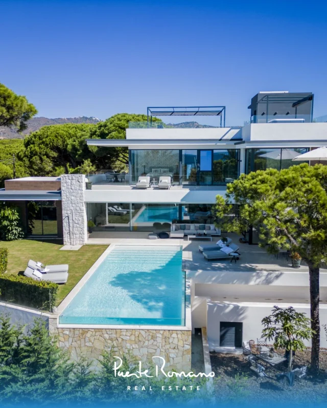 Villa View - a spectacular contemporary villa in Marbesa, one of the most desirable areas of Marbella East, just moments from one of Elviria’s finest beaches.Asking price: €5,900,000❈ 725 m² total with 80 m² of terraces on a 1,060 m² plot❈ Six en-suite bedrooms plus guest toilet, arranged over three levels❈ South-facing heated saltwater pool and mature private garden❈ Lift access, cinema room, gym, sauna and wine cellar❈ Rooftop solarium with Jacuzzi and panoramic coastal views❈ Open-plan living with island kitchen, office and laundry❈ Private garage, covered parking and 24-hour alarm systemEnergy Rating: Consumption: C / Emissions: BLocation: Marbesa, Marbella EastReference: 15470More information: prre.link/15470Contact us to arrange a viewing.#PuenteRomanoRealEstate #MarbesaMarbella #MarbellaRealEstate